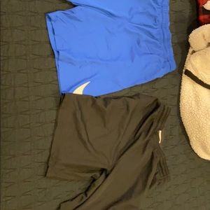 2 pairs of black and blue shorts not XL